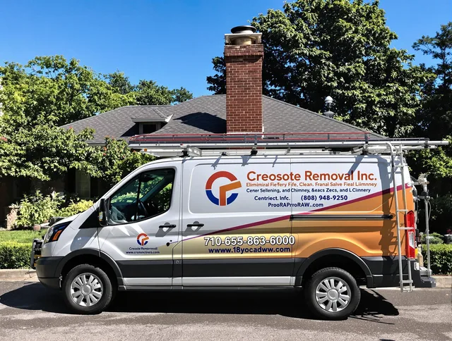 Lancaster Chimney Sweep technician removing creosote safely in Lancaster, OH